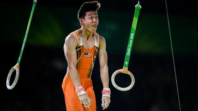 Malaysia's Phay Xing Loo competes on the rings during the men's individual all-around final in the artistic gymnastics event at the Coomera Indoor Sports Centre on April 7, 2018. (Ye Aung Thu / AFP)