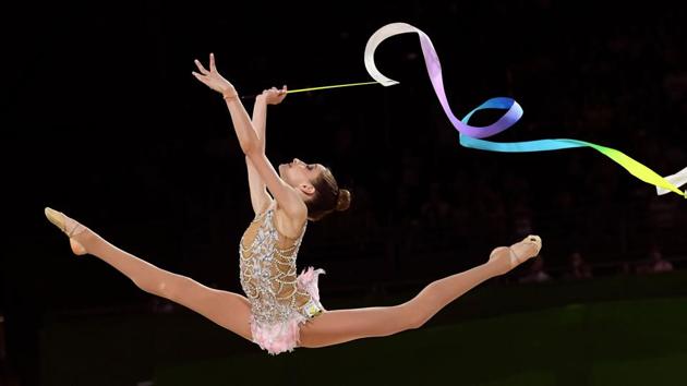 Viktoria Skittidi of Cyprus performs with the ribbon during the women's rhythmic gymnastics team final at the Coomera Indoor Sports Centre on April 11, 2018. (William West / AFP)