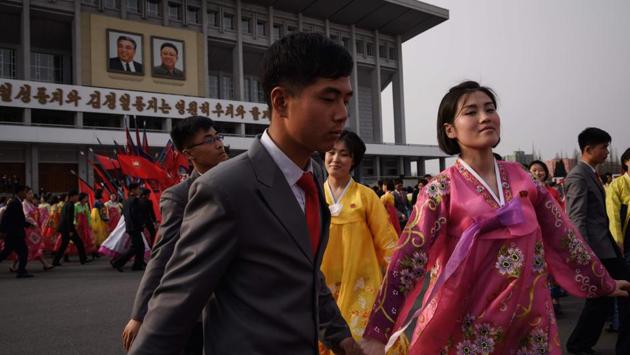 Students participate in a ‘mass dance’ event outside the Pyongyang Indoor Stadium in celebration of late leader Kim Jong Il in Pyongyang, North Korea. (Ed Jones / AFP) Students participate in a ‘mass dance’ event outside the Pyongyang Indoor Stadium in celebration of late leader Kim Jong Il in Pyongyang, North Korea. (Ed Jones / AFP)