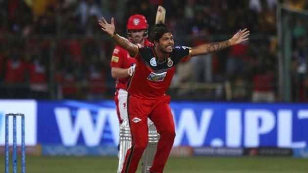 Umesh Yadav, front, appeals successfully for the wicket of Aaron Finch during the 2018 Indian Premier League Twenty20 match between Royal Challengers Bangalore and Kings XI Punjab at the M Chinnaswamy Stadium on Friday. (AP) Umesh Yadav, front, appeals successfully for the wicket of Aaron Finch during the 2018 Indian Premier League Twenty20 match between Royal Challengers Bangalore and Kings XI Punjab at the M Chinnaswamy Stadium on Friday. (AP)