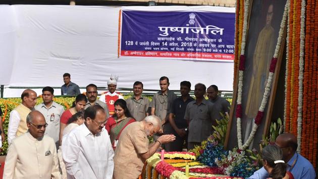 Prime Minister Narendra Modi pays tribute to Bhimrao Ambedkar on his 127th birth anniversary at Parliament House in New Delhi on Saturday.(PTI Photo)