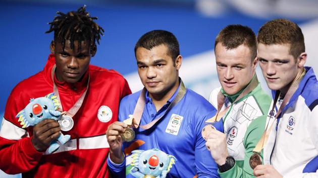 Vikas Krishan won the men’s 75 kg gold by beating Dieudonne Wilfried Seyi Ntsengue of Cameroon in the final with a unanimous 5:0 decision by the judges in favour of the Indian (AFP) Vikas Krishan won the men’s 75 kg gold by beating Dieudonne Wilfried Seyi Ntsengue of Cameroon in the final with a unanimous 5:0 decision by the judges in favour of the Indian (AFP)