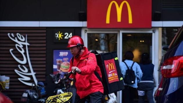 US President Donald Trump's tariffs on Chinese goods have roused some nationalist sentiment in the world's second largest economy, where consumers have a long track record of spurning foreign products when political nerves are frayed.(AFP) US President Donald Trump's tariffs on Chinese goods have roused some nationalist sentiment in the world's second largest economy, where consumers have a long track record of spurning foreign products when political nerves are frayed.(AFP)