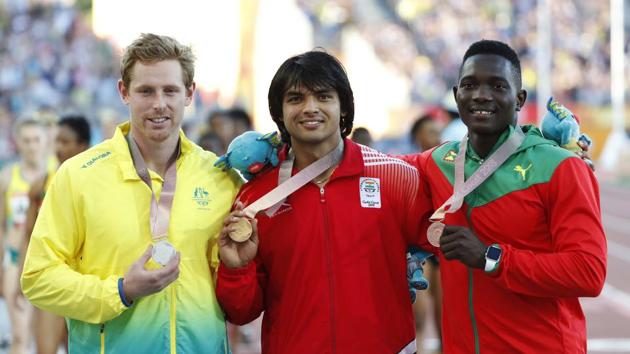Neeraj Chopra won the men’s javelin throw title after he registered his season’s best performance of 86.47m in the final. Hamish Peacock took silver for Australia with 82.59m while Grenada’s Anderson Peters hurled the javelin a distance of 82.20m for the bronze (REUTERS) Neeraj Chopra won the men’s javelin throw title after he registered his season’s best performance of 86.47m in the final. Hamish Peacock took silver for Australia with 82.59m while Grenada’s Anderson Peters hurled the javelin a distance of 82.20m for the bronze (REUTERS)