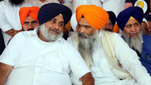 SAD president Sukhbir Singh Badal with SAD general secretary Prem Singh Chandumajra at Takht Shri Damdama Sahib in Talwandi Sabo on the occasion of Baisakhi on Saturday.(Sanjeev Kumar/HT)