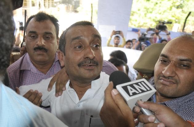 BJP MLA Kuldeep Singh Sengar reacts after being produced at CBI court in Lucknow, in connection with the Unnao rape case.(Subhankar Chakraborty/HT Photo)