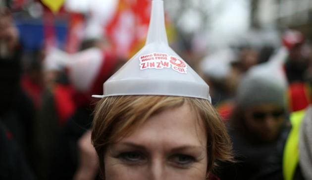 A protester attends a demonstration during a national day of strike against reforms in Paris, France, March 22(REUTERS)