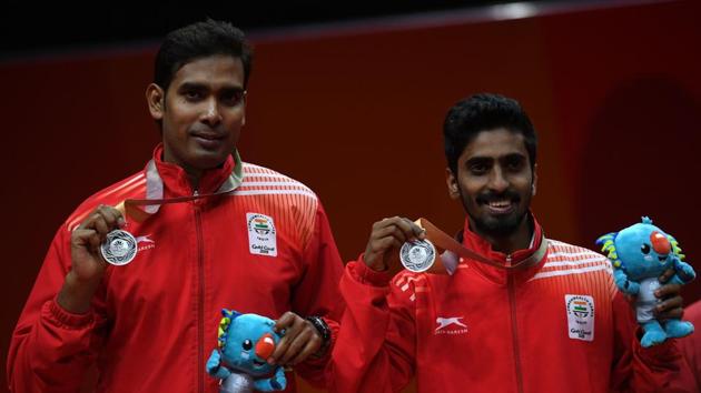 Achanta Sharath Kamal-Sathiyan Gnanasekaran lost the table tennis men’s doubles final to settle for silver. Earlier, Sharath Kamal was beaten 0-4 by Nigeria’s Quadri Aruna in the men’s singles semi-final. (AFP) Achanta Sharath Kamal-Sathiyan Gnanasekaran lost the table tennis men’s doubles final to settle for silver. Earlier, Sharath Kamal was beaten 0-4 by Nigeria’s Quadri Aruna in the men’s singles semi-final. (AFP)