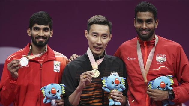 Lee Chong Wei (C), who has now won three Commonwealth Games men’s singles gold medals, was too much to handle for Srikanth (L). (REUTERS)