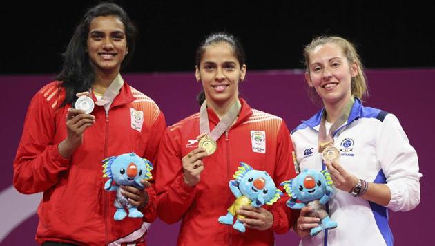 Saina Nehwal (C), PV Sindhu (L) and Kirsty Gilmour pose with their medals. (REUTERS) Saina Nehwal (C), PV Sindhu (L) and Kirsty Gilmour pose with their medals. (REUTERS)
