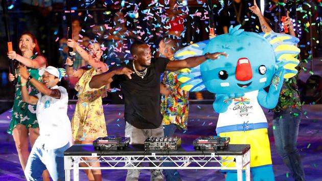 Former Jamaican sprinter Usain Bolts plays the DJ during the closing ceremony of the 2018 Commonwealth Games (CWG 2018) in Gold Coast on Sunday.(REUTERS)