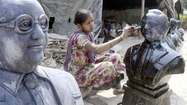 An artist applies the finishing touch to a bust of Babasaheb Ambedkar near KK Market on April 8, ahead of Ambedkar Jayanti. Ambedkar was an Indian economist, politician and social reformer who campaigned against social discrimination. (Ravindra Joshi/HT PHOTO) An artist applies the finishing touch to a bust of Babasaheb Ambedkar near KK Market on April 8, ahead of Ambedkar Jayanti. Ambedkar was an Indian economist, politician and social reformer who campaigned against social discrimination. (Ravindra Joshi/HT PHOTO)