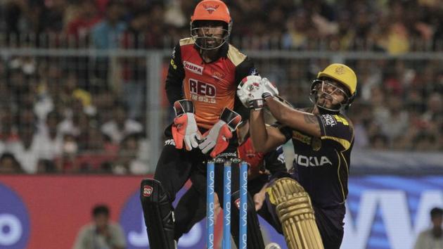 Kolkata Knight Riders' Nitish Rana in action as Sunrisers Hyderabad's wicketkeeper Wriddhiman Saha looks on. (AP) Kolkata Knight Riders' Nitish Rana in action as Sunrisers Hyderabad's wicketkeeper Wriddhiman Saha looks on. (AP)