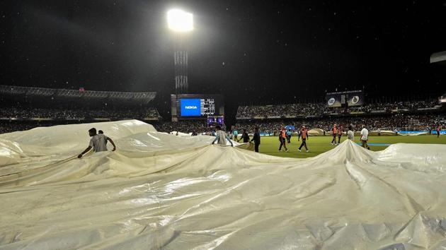 Groundsmen cover the pitch as it rains during IPL 2018 match between Kolkata Knight Riders and Sunrisers Hyderabad. (PTI) Groundsmen cover the pitch as it rains during IPL 2018 match between Kolkata Knight Riders and Sunrisers Hyderabad. (PTI)