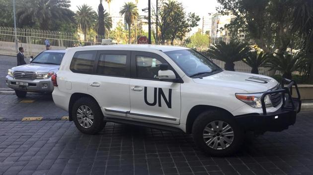United Nations vehicles carry the team of the Organization for the Prohibition of Chemical Weapons (OPCW), arrive at hotel hours after the US, France and Britian launched an attack on Syrian facilities to punish President Bashar Assad for suspected chemical attack against civilians, in Damascus, Syria,(AP)