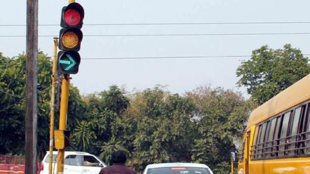 According to the data compiled by Panchkula traffic police, last year about 12,051 challans were issued for jumping red light, making it one of the most common violations.(HT File)