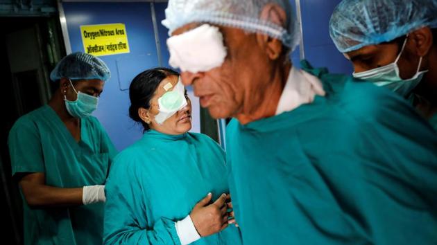 Patients with their eyes bandaged leave an operation theatre after cataract surgery, on the hospital train. Lifeline Express has treated about 1.2 million people since its launch in 1991 by the non-profit Impact India Foundation, said chief operating officer and doctor Rajnish Gourh. (Danish Siddiqui / REUTERS) Patients with their eyes bandaged leave an operation theatre after cataract surgery, on the hospital train. Lifeline Express has treated about 1.2 million people since its launch in 1991 by the non-profit Impact India Foundation, said chief operating officer and doctor Rajnish Gourh. (Danish Siddiqui / REUTERS)