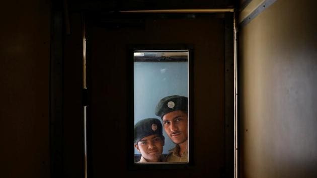 Volunteers from the National Cadet Corps wait to guide patients on the train. The government launched a scheme in February that aims to widen health insurance coverage to 500 million people, but critics say the plan is unlikely to work unless public health systems improve dramatically. Until then, options such as Lifeline Express offer crucial support. (Danish Siddiqui / REUTERS) Volunteers from the National Cadet Corps wait to guide patients on the train. The government launched a scheme in February that aims to widen health insurance coverage to 500 million people, but critics say the plan is unlikely to work unless public health systems improve dramatically. Until then, options such as Lifeline Express offer crucial support. (Danish Siddiqui / REUTERS)
