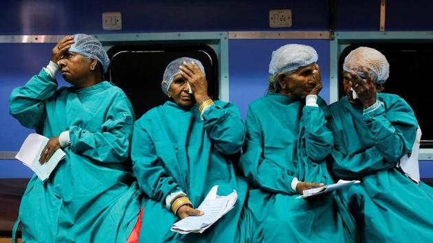 Patients cover their eyes as they wait before their cataract surgery on the Lifeline Express, at a railway station in Jalore, India. The Lifeline Express, a seven-coach train converted into a rolling hospital has crisscrossed India for 27 years to treat people living in areas with scarce healthcare. (Danish Siddiqui / REUTERS) Patients cover their eyes as they wait before their cataract surgery on the Lifeline Express, at a railway station in Jalore, India. The Lifeline Express, a seven-coach train converted into a rolling hospital has crisscrossed India for 27 years to treat people living in areas with scarce healthcare. (Danish Siddiqui / REUTERS)
