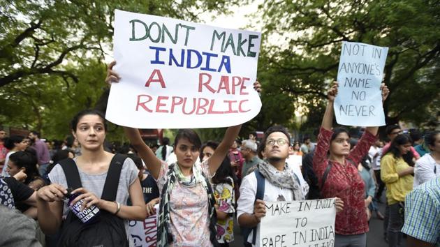 People take part in Not In My Name protest against the rape cases in Unnao and Kathua, at Parliament Street, in New Delhi, on Sunday. (Arvind Yadav/HT Photo) People take part in Not In My Name protest against the rape cases in Unnao and Kathua, at Parliament Street, in New Delhi, on Sunday. (Arvind Yadav/HT Photo)