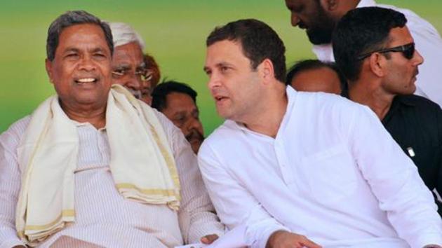 Congress president Rahul Gandhi and Karnataka CM Siddaramaiah during the Janashirvad yatra in Belgaum district in Karnataka.(PTI File Photo)