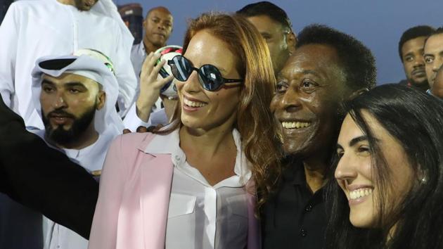 Brazilian football team legend Pele (2nd-R) poses for a photograph at the Dubai Opera gardens prior to a friendly football game on Sunday. (AFP) Brazilian football team legend Pele (2nd-R) poses for a photograph at the Dubai Opera gardens prior to a friendly football game on Sunday. (AFP)