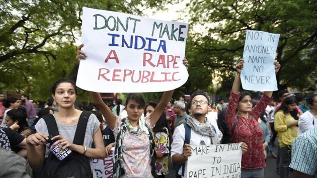 People take part in Not In My Name protest against the rape cases in Unnao and Kathua, at Parliament Street, in New Delhi, on Sunday.(Arvind yadav/HT Photo)