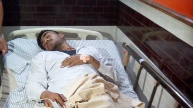 Rohit Yadav, one of the two shooters who allegedly attacked a journalist in Ghaziabad earlier this month, in hospital after being injured in police firing.(HT Photo)