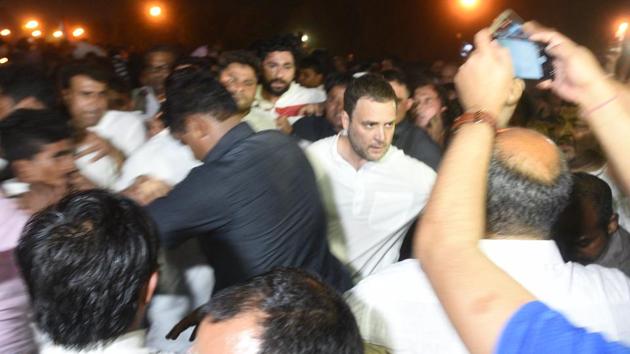 Scores of Congress workers assembled near India Gate in central Delhi on April 12 night after party chief Rahul Gandhi called on people to join a “silent, peaceful protest” demanding justice for victims of rape and murder. He demanded action from the BJP-led Centre to ensure women’s safety. (Raj K Raj / HT Photo) 