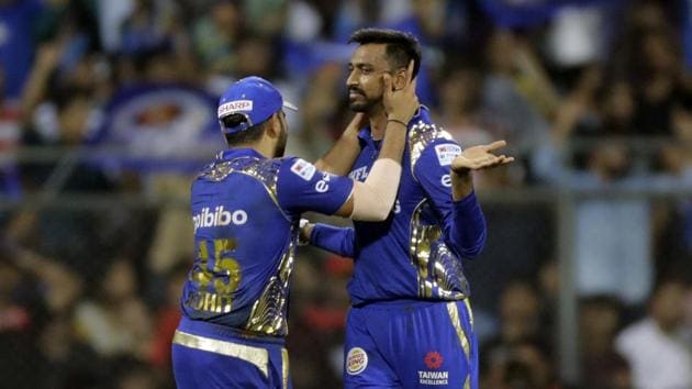 Krunal Pandya celebrates after taking the wicket of Corey Anderson during match fourteen of the 2018 Indian Premier League 2018 (IPL 2018) between Mumbai Indians and Royal Challengers Bangalore at the Wankhede Stadium in Mumbai. Get full cricket score of Mumbai Indians and Royal Challengers Bangalore, IPL 2018, at the Wankhede stadium here(AP)