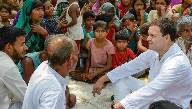 Congress president Rahul Gandhi meets farmers during a visit to his home constituency of Amethi. (PTI) Congress president Rahul Gandhi meets farmers during a visit to his home constituency of Amethi. (PTI)
