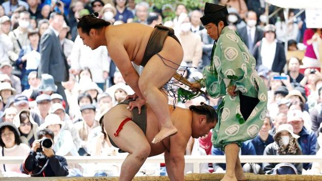 Wrestlers perform a show fight during the annual sumo tournament. The audience gathered was treated to exhibition bouts, preceded by time-honoured foot-stamping ceremonies, as well as traditional chanting and even a comedy routine explaining the dos and don’ts of sumo wrestling. (Toru Hanai / REUTERS) Wrestlers perform a show fight during the annual sumo tournament. The audience gathered was treated to exhibition bouts, preceded by time-honoured foot-stamping ceremonies, as well as traditional chanting and even a comedy routine explaining the dos and don’ts of sumo wrestling. (Toru Hanai / REUTERS)