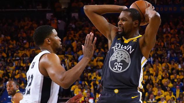 Golden State Warriors forward Kevin Durant (35) controls the ball against San Antonio Spurs forward Rudy Gay (22).(USA TODAY Sports) Golden State Warriors forward Kevin Durant (35) controls the ball against San Antonio Spurs forward Rudy Gay (22).(USA TODAY Sports)