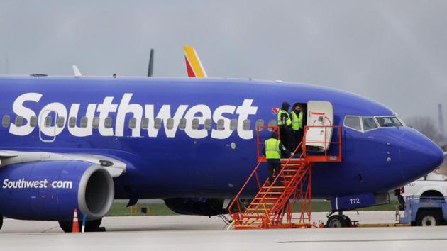 A Southwest Airlines jet sits on the runway at Philadelphia International Airport after it was forced to land with an engine failure, in Philadelphia, Pennsylvania.(AFP) A Southwest Airlines jet sits on the runway at Philadelphia International Airport after it was forced to land with an engine failure, in Philadelphia, Pennsylvania.(AFP)