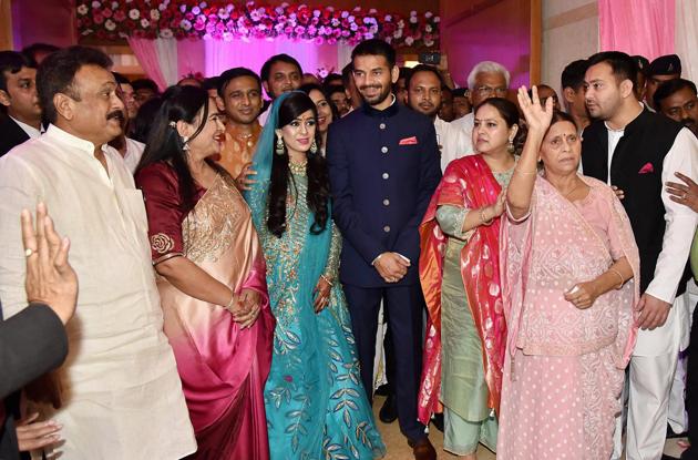 Rashtriya Janata Dal chief Lalu Prasad Yadav's elder son Tej Pratap Yadav with fiancee Aishwarya Rai, granddaughter of former Bihar chief minister Daroga Prasad Rai, during their engagement function in Patna on Wednesday.(PTI)