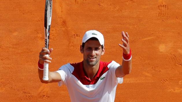 Serbia's Novak Djokovic celebrates after winning his second round match against Croatia's Borna Coric at the Monte Carlo Masters.(REUTERS)