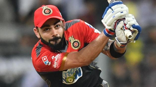Virat Kohli, who surpassed Suresh Raina, also became the first batsman to score 5000 runs in IPL history.(AFP) Virat Kohli, who surpassed Suresh Raina, also became the first batsman to score 5000 runs in IPL history.(AFP)