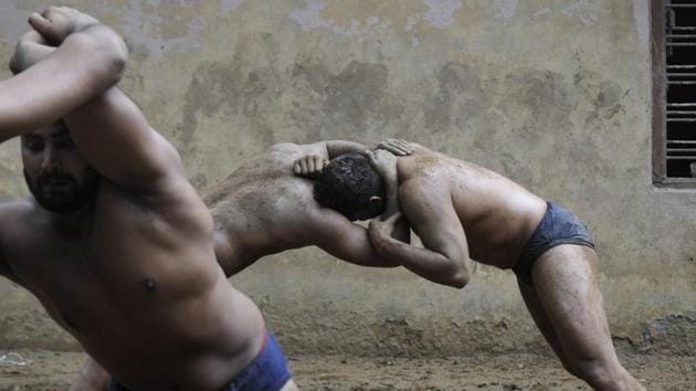 In such times of economic uncertainty, the ‘dangal’ season which begins in August is a windfall for wrestlers as organizers place bets on them according to the tournaments they have participated in. A national level wrestler for instance, can easily fetch a bet of Rs 30,000 whereas an Asian Games wrestler gets a bet as high as Rs 50,000. (Sunil Ghosh / HT Photo) In such times of economic uncertainty, the ‘dangal’ season which begins in August is a windfall for wrestlers as organizers place bets on them according to the tournaments they have participated in. A national level wrestler for instance, can easily fetch a bet of Rs 30,000 whereas an Asian Games wrestler gets a bet as high as Rs 50,000. (Sunil Ghosh / HT Photo)