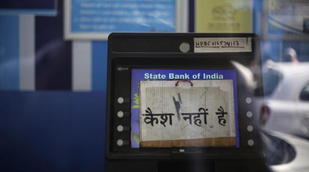 A "no cash" sign on an ATM machine in New Delhi. on Tuesday, people complained ATMs in several parts of the city had run out of cash.(AP Photo)