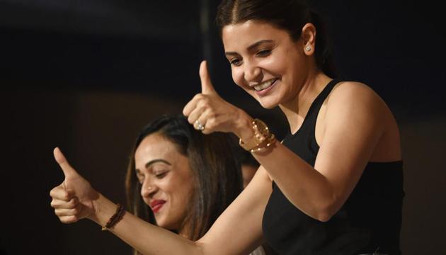 Anushka Sharma celebrates the RCB win, captained by Virat Kohli, during the IPL 2018 match between Royal Challengers Bangalore and King's XI Punjab at Chinnaswamy Stadium in Bengaluru on Friday. (PTI) Anushka Sharma celebrates the RCB win, captained by Virat Kohli, during the IPL 2018 match between Royal Challengers Bangalore and King's XI Punjab at Chinnaswamy Stadium in Bengaluru on Friday. (PTI)