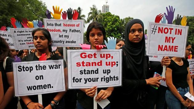 People participate in a protest in Kolkata on Tuesday against the rape of an eight-year-old girl in Kathua near Jammu, and a teenager in Unnao, Uttar Pradesh. (REUTERS) People participate in a protest in Kolkata on Tuesday against the rape of an eight-year-old girl in Kathua near Jammu, and a teenager in Unnao, Uttar Pradesh. (REUTERS)