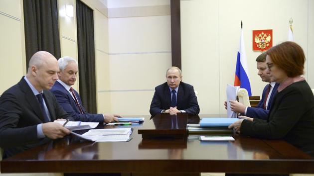 Russian President Vladimir Putin, center, leads a meeting at the Novo-Ogaryovo residence outside Moscow, Russia, Tuesday, April 17, 2018.(AP Photo)