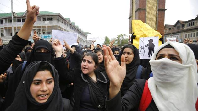 Law students hold placards during a protest calling for justice in the rape and murder case of an eight-year-old girl in Kathua, at Srinagar. (Waseem Andrabi / HT Photo) Law students hold placards during a protest calling for justice in the rape and murder case of an eight-year-old girl in Kathua, at Srinagar. (Waseem Andrabi / HT Photo)
