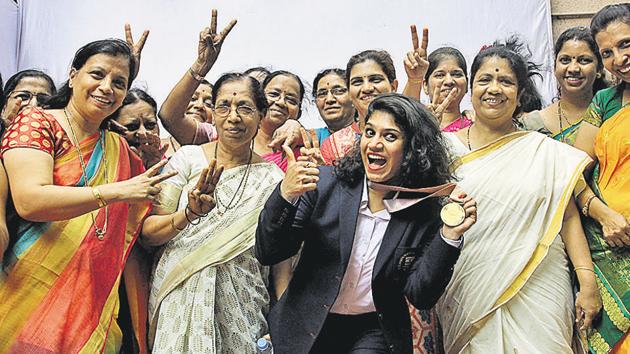 Table Tennis player Madhurika Patkar Torgalkar, who bagged a gold medal at the Commonwealth Games 2018, gets a grand welcome at her home in Mulund on Tuesday. (Praful Gangurde/ HT Photo) Table Tennis player Madhurika Patkar Torgalkar, who bagged a gold medal at the Commonwealth Games 2018, gets a grand welcome at her home in Mulund on Tuesday. (Praful Gangurde/ HT Photo)