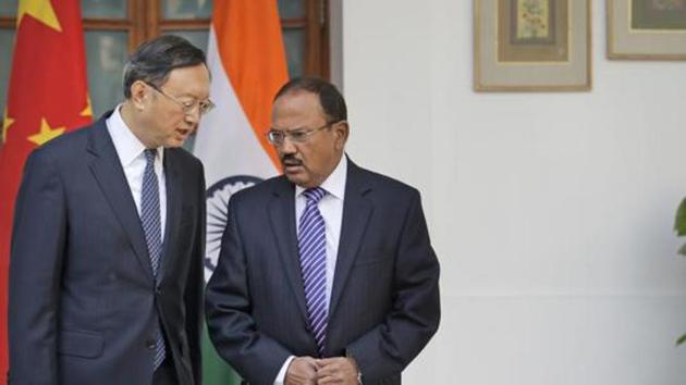 National Security Advisor Ajit Doval with Chinese State Councillor Yang Jiechi before their delegation-level meeting in New Delhi. (AP File Photo) National Security Advisor Ajit Doval with Chinese State Councillor Yang Jiechi before their delegation-level meeting in New Delhi. (AP File Photo)
