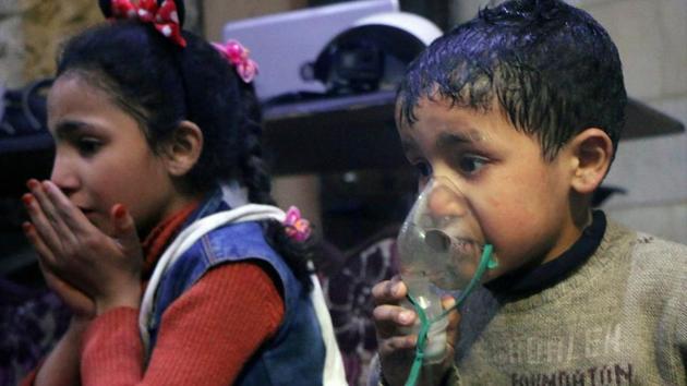 This file image released early Sunday, April 8, 2018 by the Syrian Civil Defense White Helmets, shows a child receiving oxygen through a respirator following an alleged poison gas attack in the rebel-held town of Douma, near Damascus, Syria.(AP File Photo)