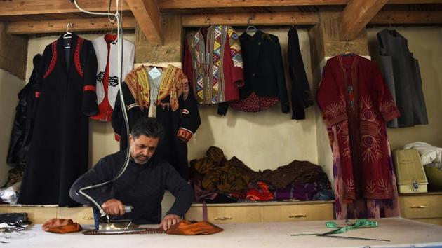 Only decades ago, textiles were on par with Afghanistan’s legendary carpet trade. During its heyday textiles were more than just fabrics, with their patterns, colours and embroidery illuminating the origins and tribal history of their makers. “But now, we are trying hard just to keep them as ornaments on jackets and coats, to maintain the know-how,” Sherzad said. (Wakil Kohsar / AFP) Only decades ago, textiles were on par with Afghanistan’s legendary carpet trade. During its heyday textiles were more than just fabrics, with their patterns, colours and embroidery illuminating the origins and tribal history of their makers. “But now, we are trying hard just to keep them as ornaments on jackets and coats, to maintain the know-how,” Sherzad said. (Wakil Kohsar / AFP)
