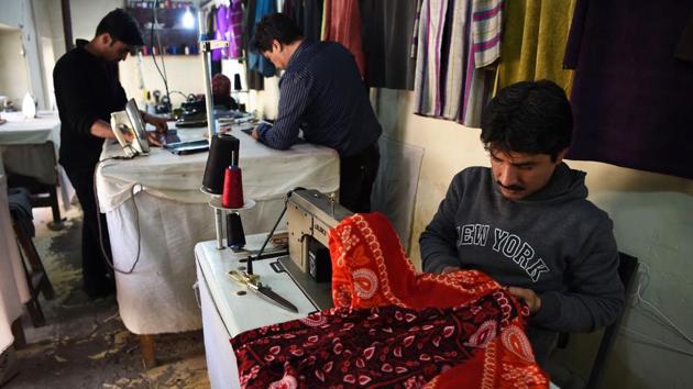 According to data provided by the World Bank, 19% of Afghan women were employed in 2017 -- which excludes the informal agricultural sector. Sherzad says the decline in the craft has put large numbers of women out of work who once were able to make a living at home. (Wakil Kohsar / AFP) According to data provided by the World Bank, 19% of Afghan women were employed in 2017 -- which excludes the informal agricultural sector. Sherzad says the decline in the craft has put large numbers of women out of work who once were able to make a living at home. (Wakil Kohsar / AFP)