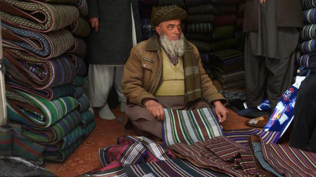 With Zarif, she hopes to fill the gap while aiming to preserve Afghanistan’s textile traditions and designing contemporary takes on Afghan fashion staples. The bazaars in Mazar-i-Sharif are stacked with striped and padded chapans -- popularised in the West by ex-President Hamid Karzai. The cheaper knock-offs are printed on nylon, rather than silk, closely replicating traditional designs but at a third of the price. (Farshad Usayn / AFP) With Zarif, she hopes to fill the gap while aiming to preserve Afghanistan’s textile traditions and designing contemporary takes on Afghan fashion staples. The bazaars in Mazar-i-Sharif are stacked with striped and padded chapans -- popularised in the West by ex-President Hamid Karzai. The cheaper knock-offs are printed on nylon, rather than silk, closely replicating traditional designs but at a third of the price. (Farshad Usayn / AFP)