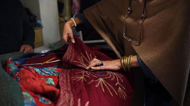 To survive, Zarif relies on connections in Paris, where the company is supported by French fashion brand “Agnes b.”, along with a stable of faithful clientele in New York. And even as she seeks to preserve, Sherzad is also forced to adapt, scouring Afghanistan’s antique shops in search of richly crafted garments that can be refashioned into bags or the linings for men’s jackets. (Wakil Kohsar / AFP) To survive, Zarif relies on connections in Paris, where the company is supported by French fashion brand “Agnes b.”, along with a stable of faithful clientele in New York. And even as she seeks to preserve, Sherzad is also forced to adapt, scouring Afghanistan’s antique shops in search of richly crafted garments that can be refashioned into bags or the linings for men’s jackets. (Wakil Kohsar / AFP)